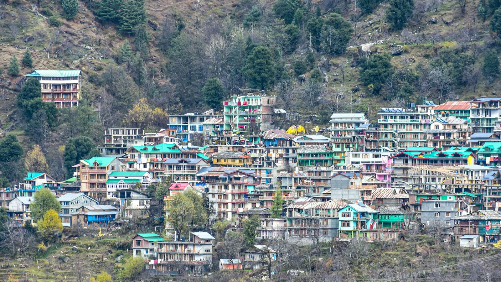 A hillside town of colourful houses in Himachal Pradesh